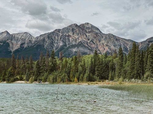 A lake, forest and mountains in Jasper National Park. 
